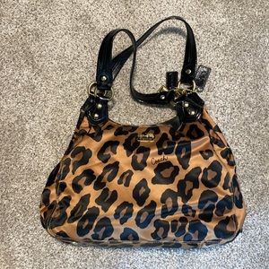 Leopard Coach hand bag and matching wallet